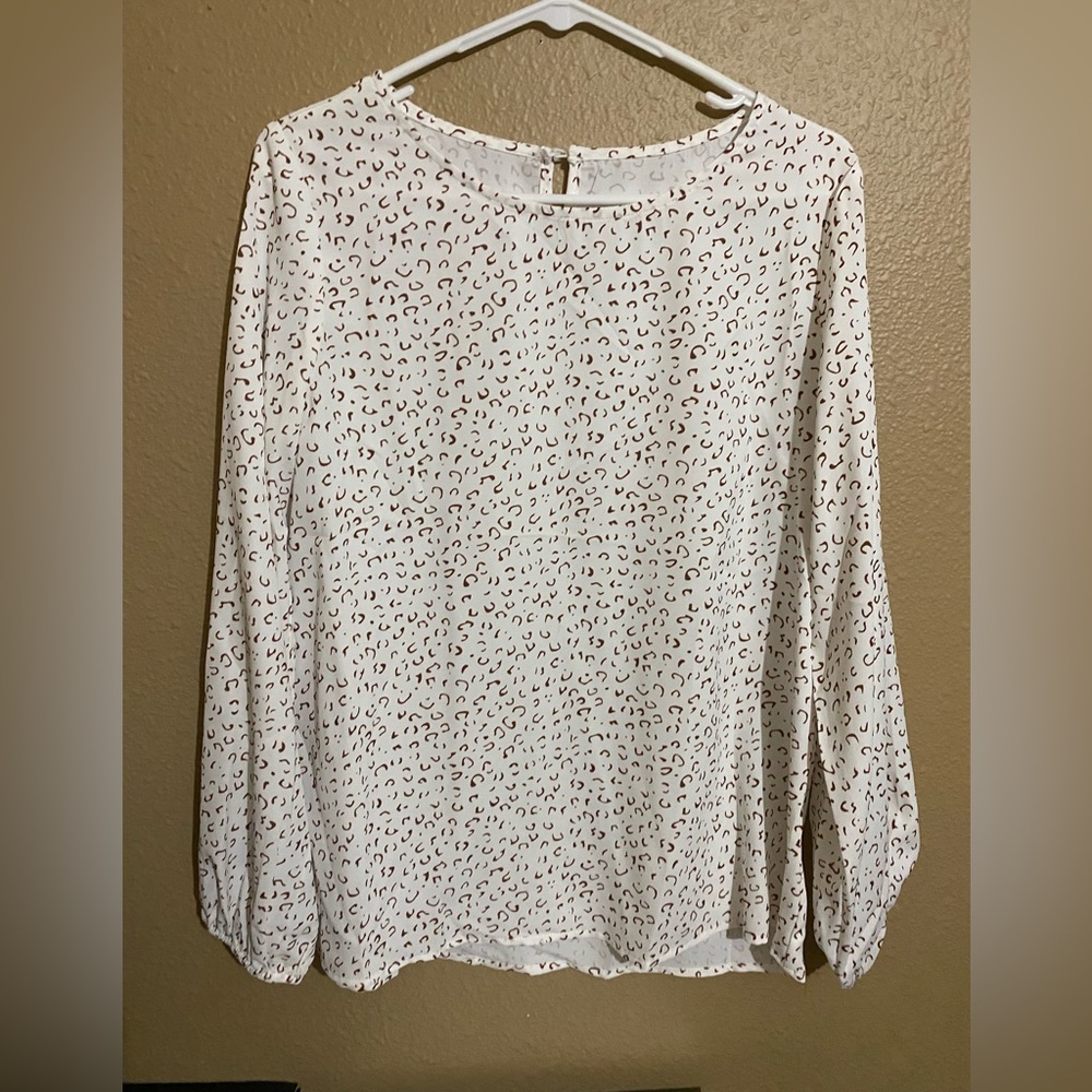 White Leopard Women's Dressy Top size small.